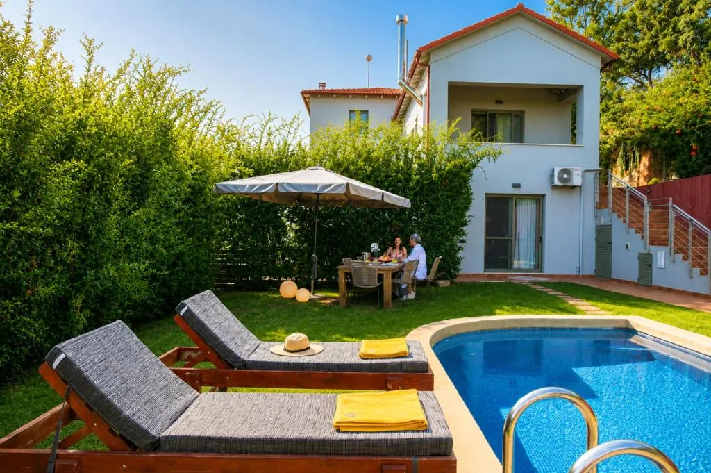 Villa Erato exterior with private pool and shaded dining area, Physis Villas Chania